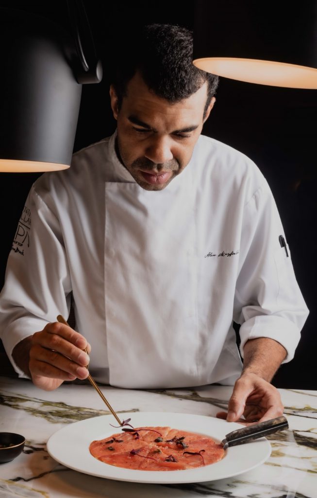 Close up shot of a chef preparing a dish