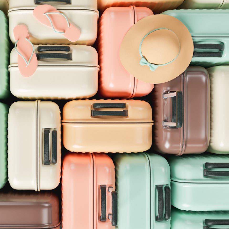 A bunch of suitcases and hats are stacked together