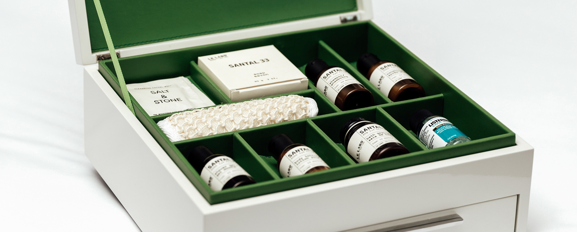 Signature ette hotel amenity box of bath products in a guest room